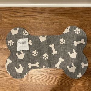 Dog bone print mat for dog dishes. Never used. NWT